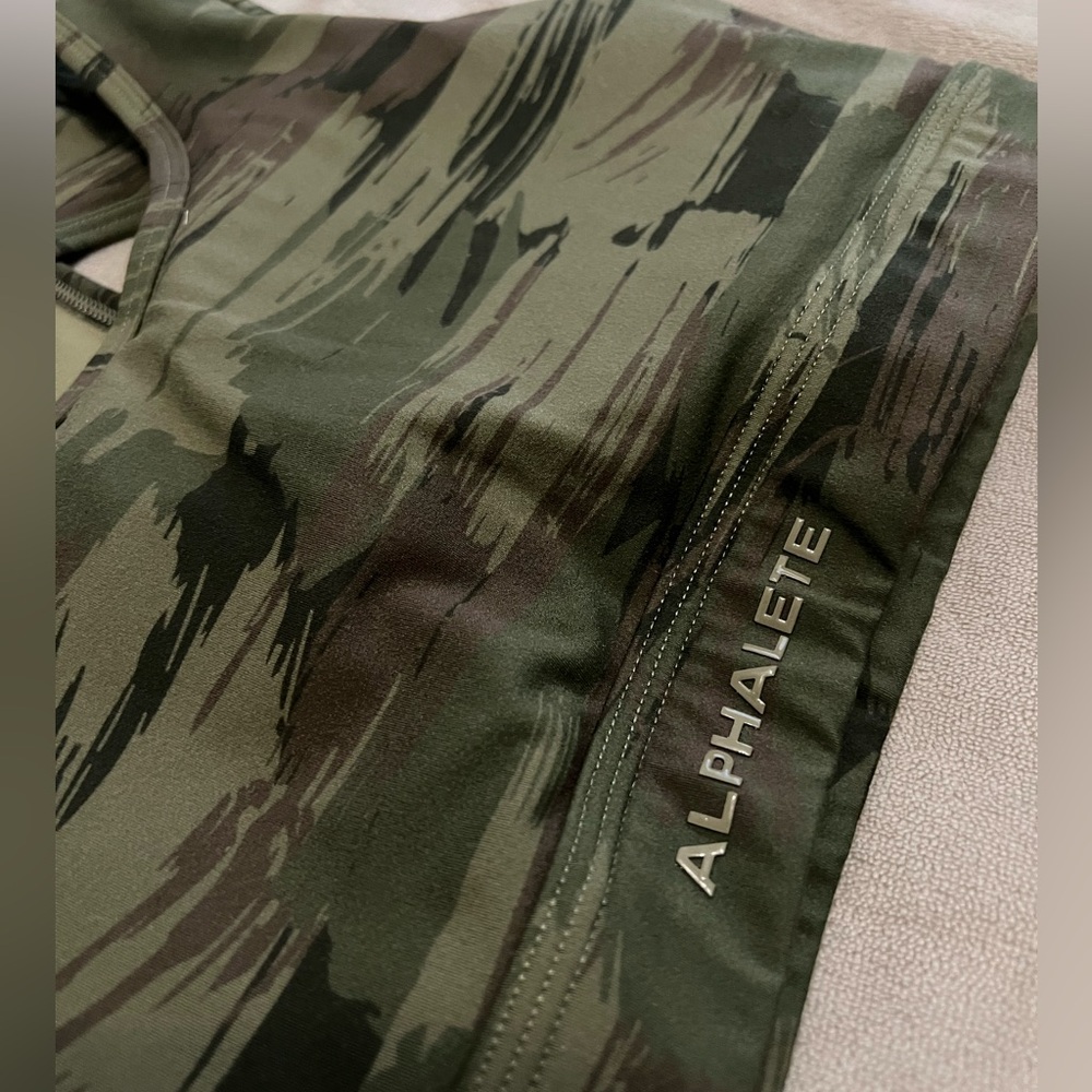 Size Medium Alphalete sports bra, hardly worn and in very good condition.